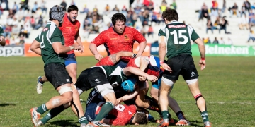 men playing rugby football
