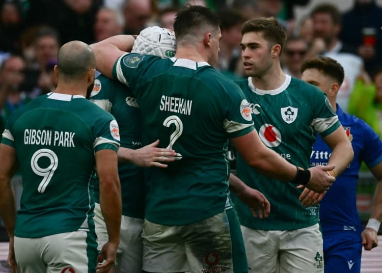 Ireland's players celebrate scoring a try during Six Nations international rugby union match between Italy and Ireland at Stadio Olimpico in Rome on March 15, 2025. (Photo by Filippo MONTEFORTE / AFP)