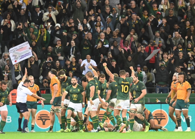 South African players celebrate scoring a try during the Rugby Championship second round Test match between South Africa and Australia at the DHL Stadium in Cape Town on August 23, 2025. (Photo by RODGER BOSCH / AFP)